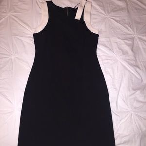 Black dress with white arm straps
